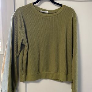 green long sleeve top